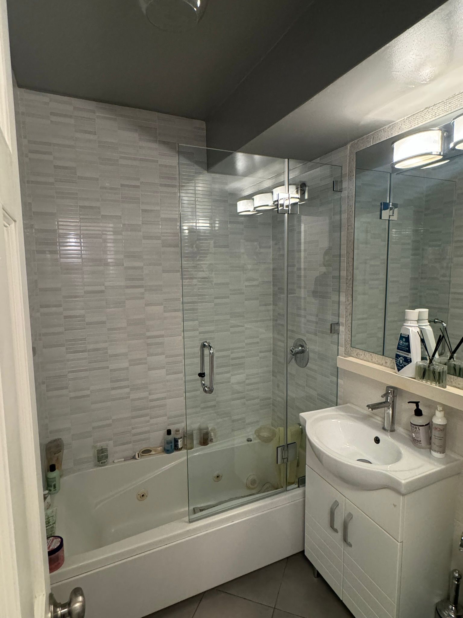 Custom frameless shower enclosure installed by MetroGlass Pro NYC