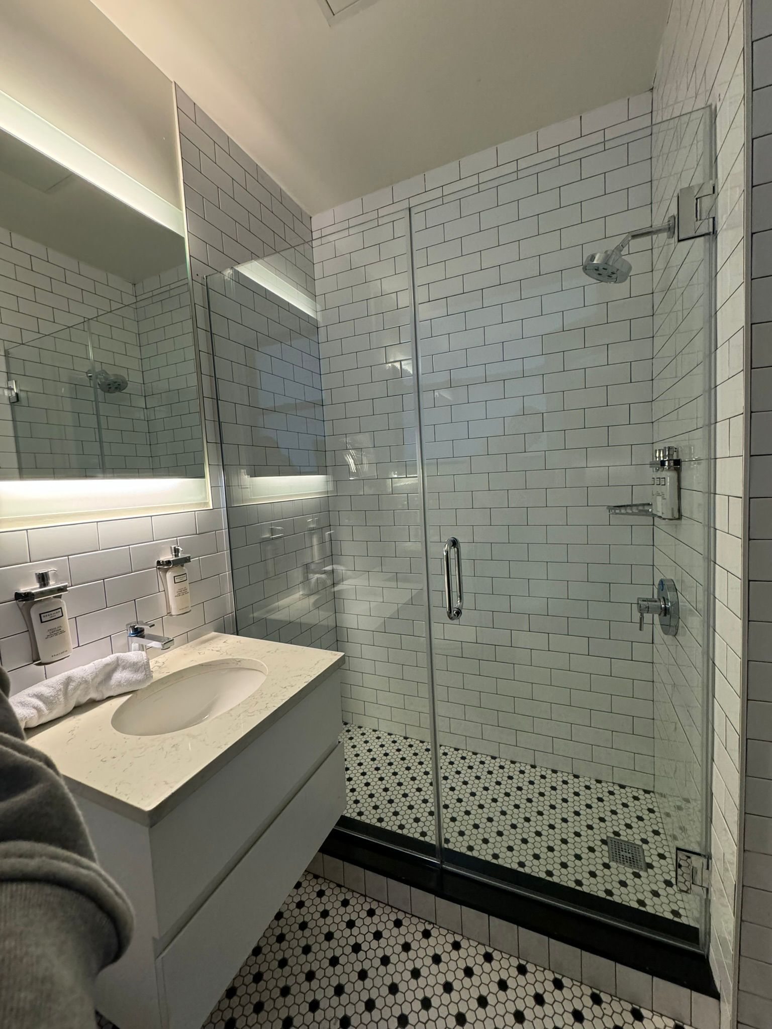 Custom frameless shower enclosure installed by MetroGlass Pro NYC