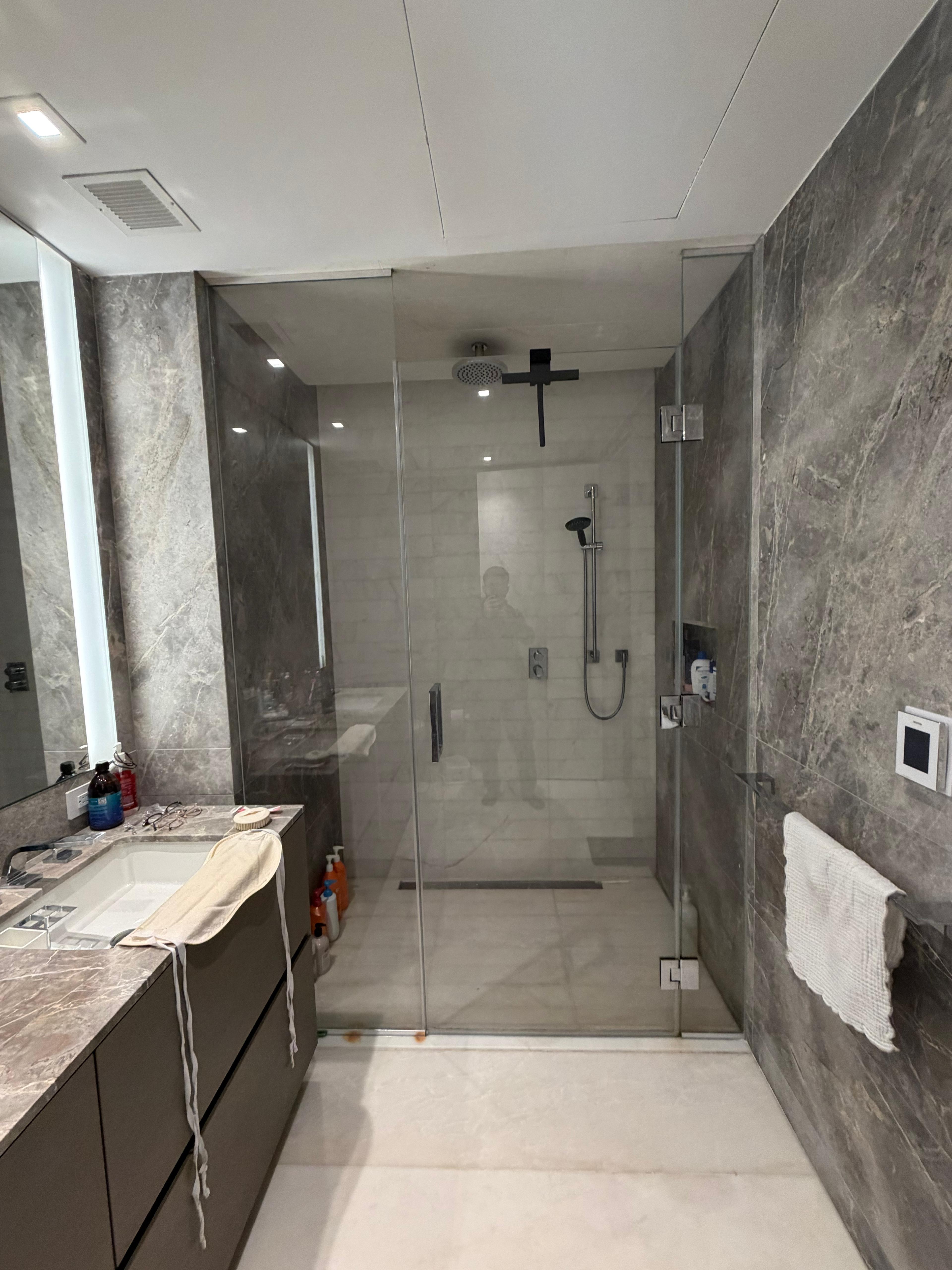Custom frameless shower enclosure installed by MetroGlass Pro NYC