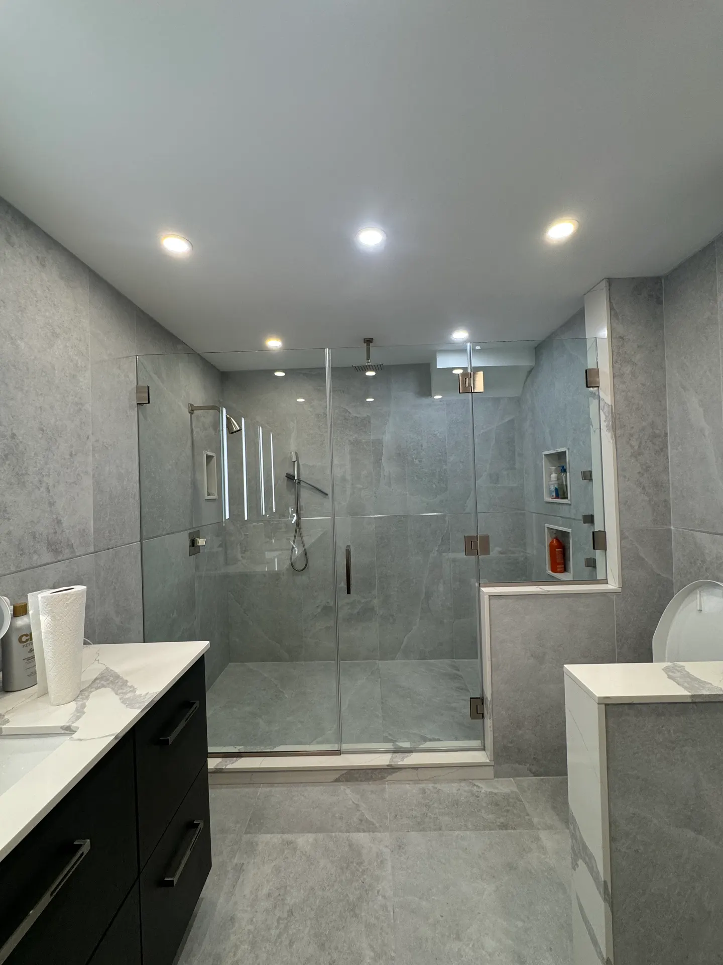 Large frameless shower glass enclosure
