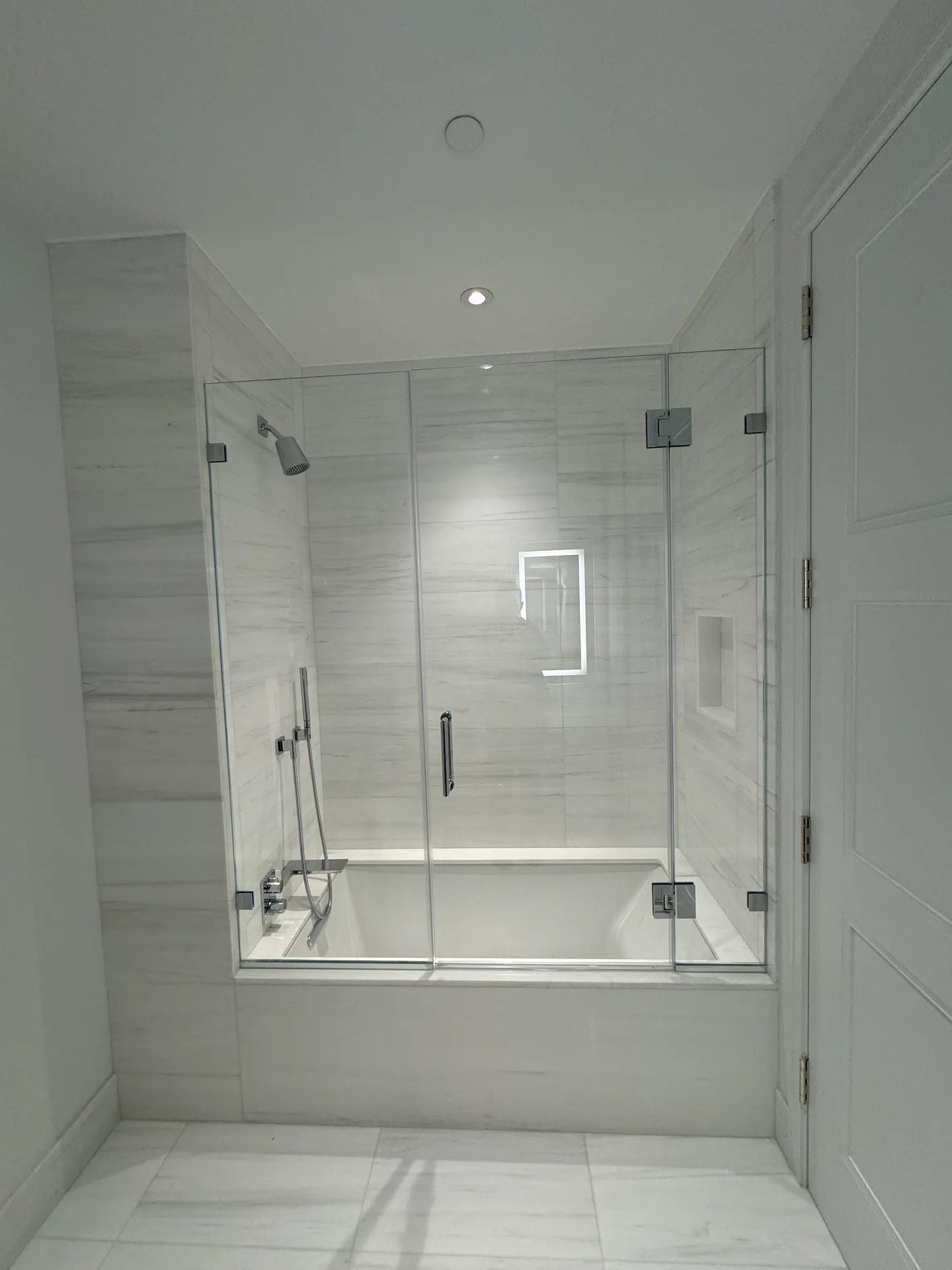 Frameless enclosure NYC apartment
